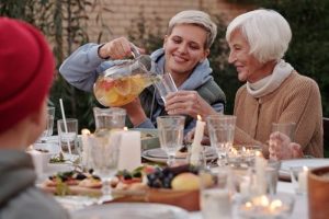 Medicaid planning, image of two women drinking beverages outside