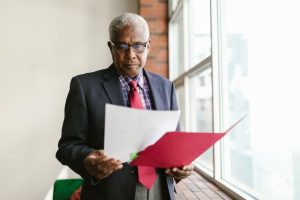 revocable living trust, image of a man examining a document