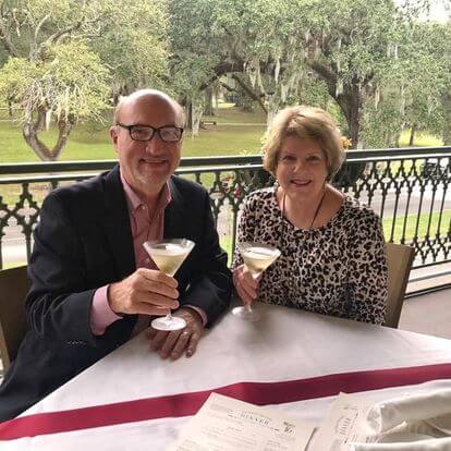 An older couple enjoying martinis at a restaurant; Community Property