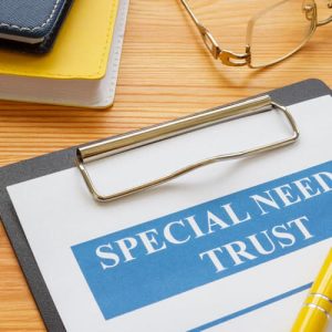 Special needs trust on a clipboard; Metairie and New Orleans Special Needs Planning