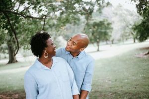 use a trust, image of happy couple in a park
