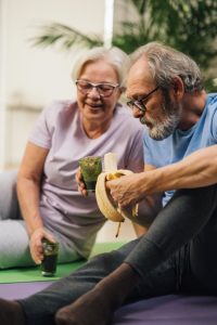 estate planning, image of older couple eating outdoors