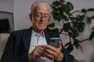 plan your estate, image of older man using his cellphone